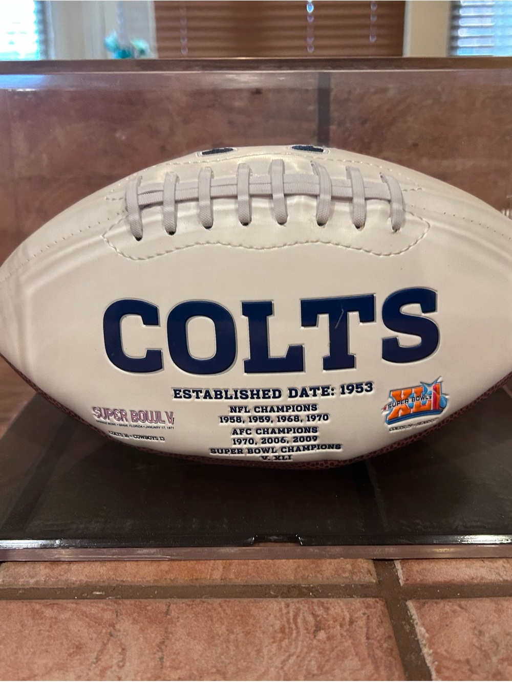 Peyton Manning signed Indianapolis Colts football in display case